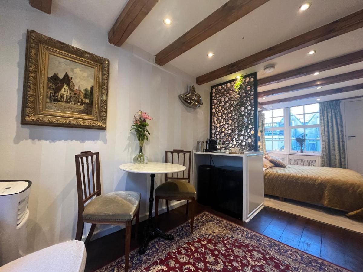 The Enlightened House Luxury Suites Amesterdão Exterior foto